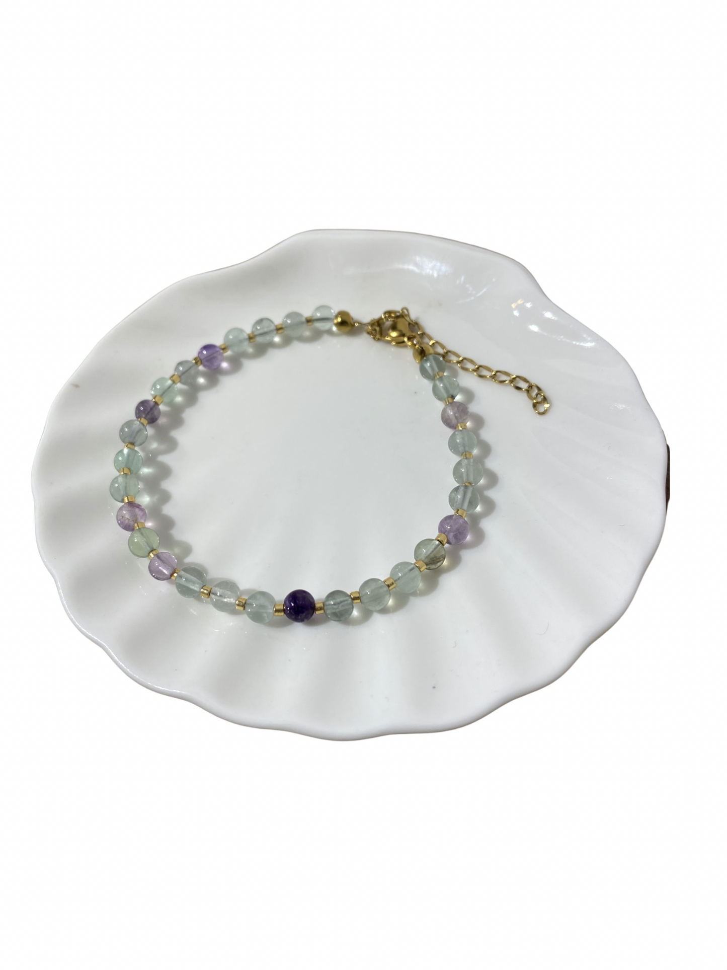 Fluoriet armband RVS goud 4 mm