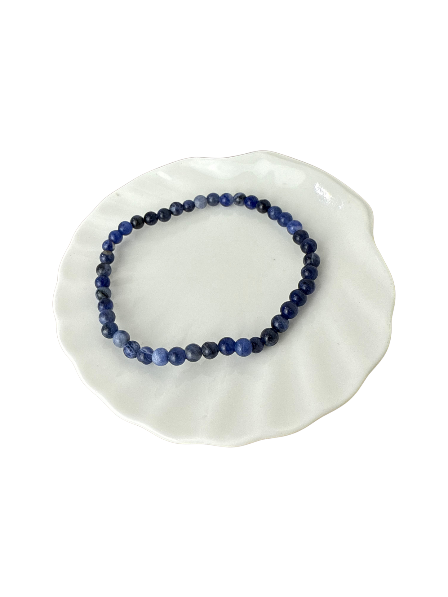 Sodaliet kogelarmband 4 mm