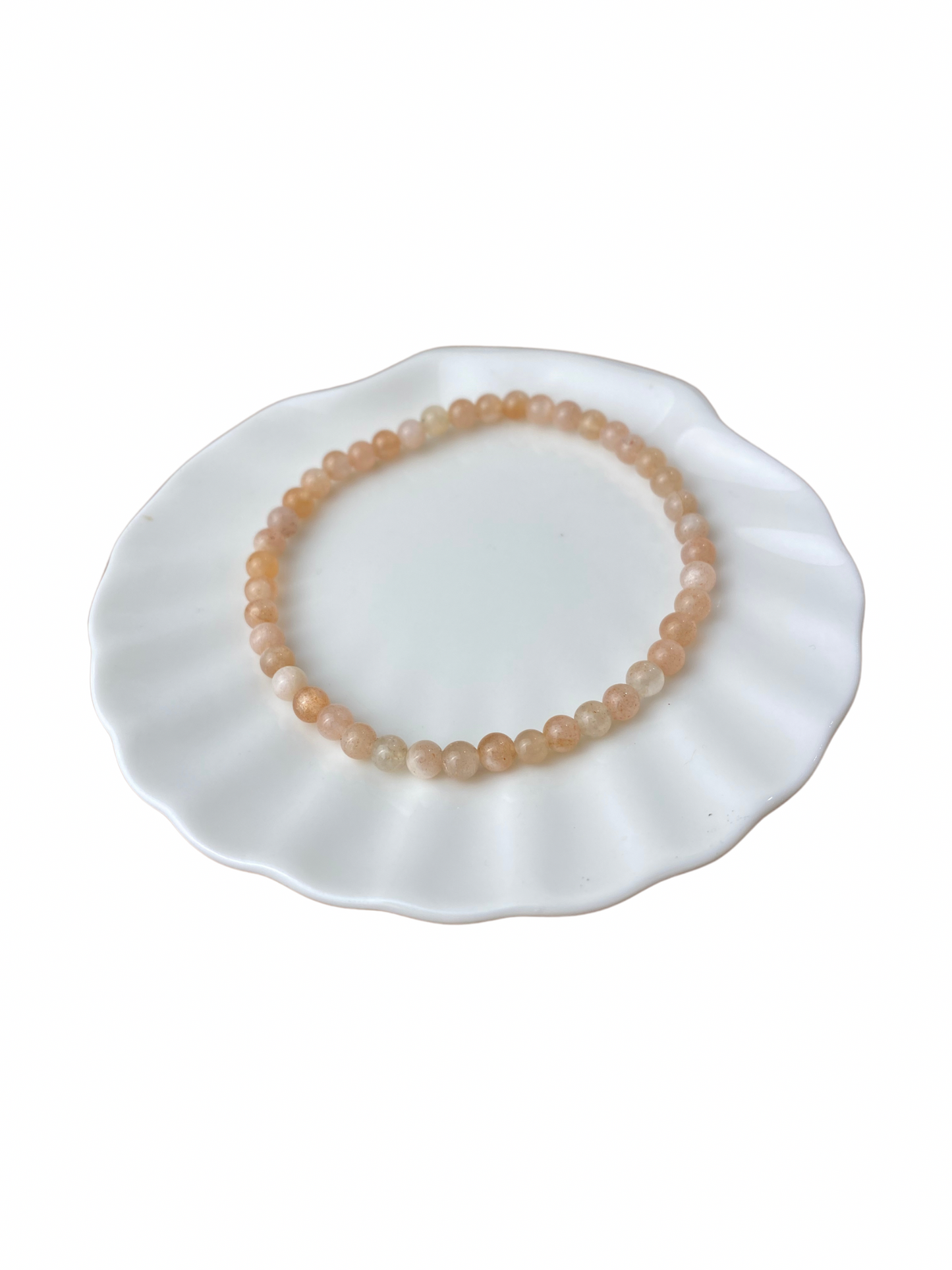 Maansteen (perzik) kogelarmband 4 mm