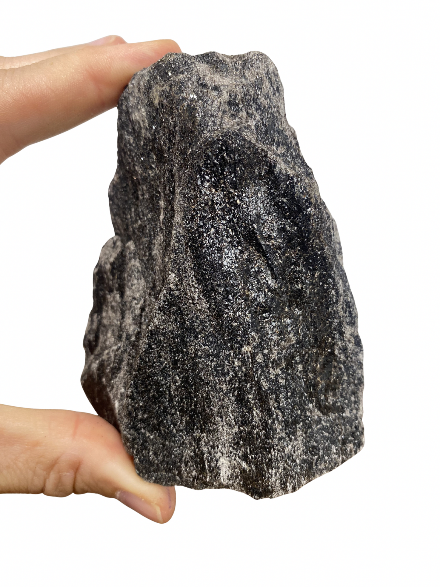 Raw Fuchsite sculpture on a stand