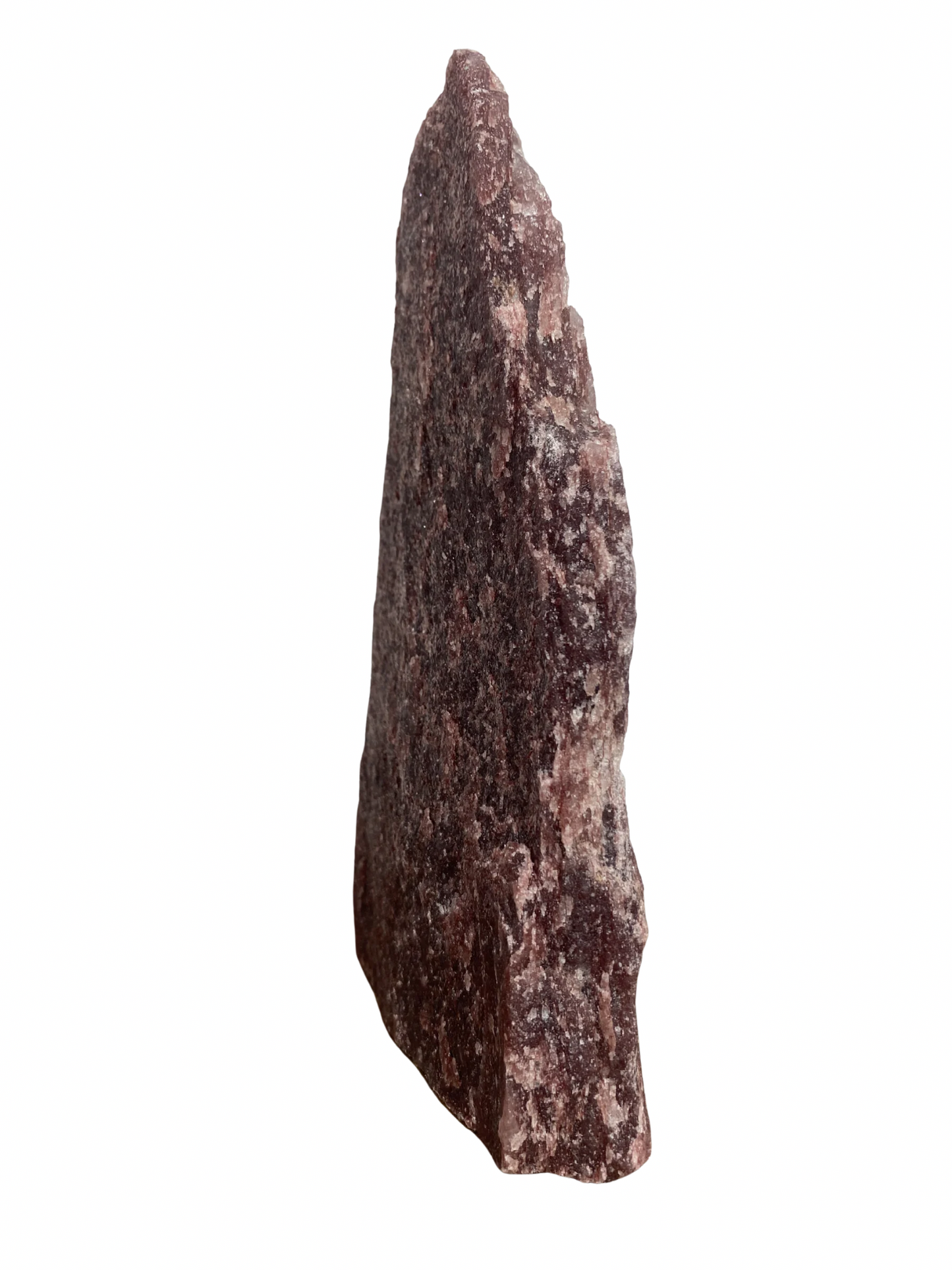 Raw Fuchsite sculpture on a stand