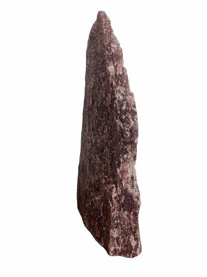 Raw Fuchsite sculpture on a stand