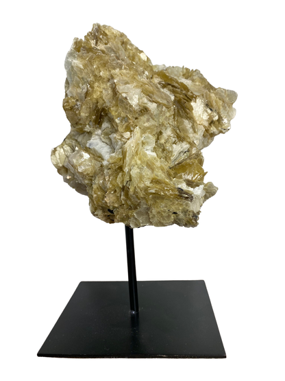Raw Fuchsite sculpture on a stand