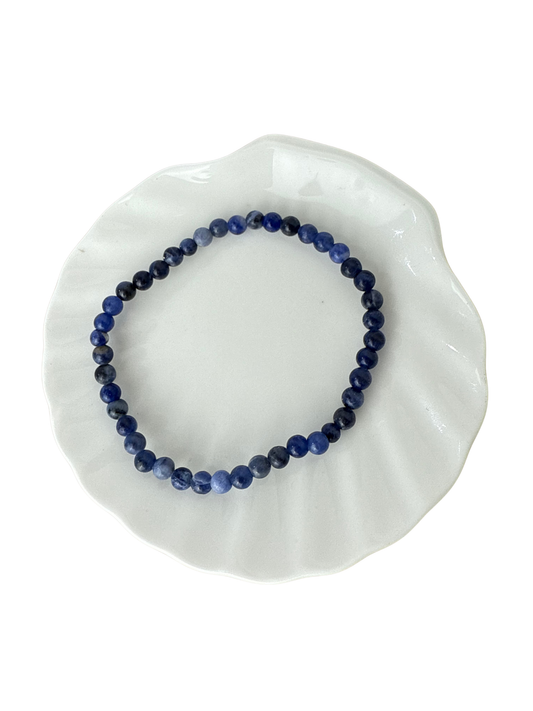 Sodaliet kogelarmband 4 mm