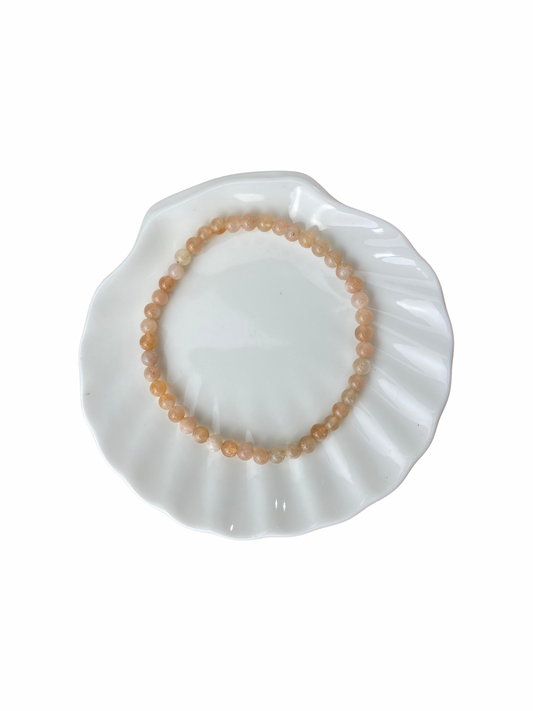 Maansteen (perzik) kogelarmband 4 mm