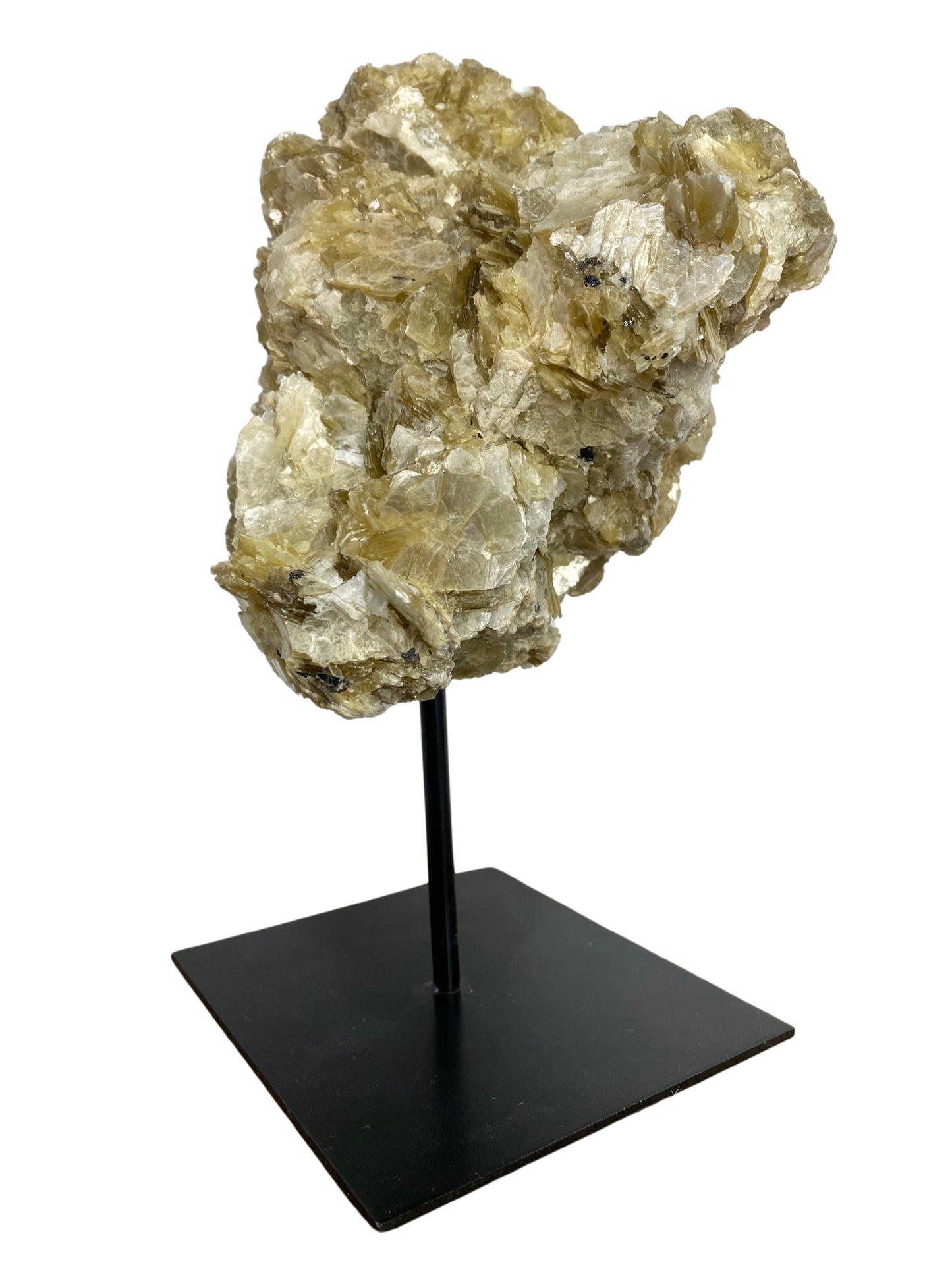 Raw Fuchsite sculpture on a stand
