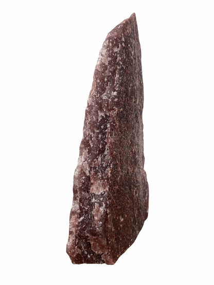 Raw Fuchsite sculpture on a stand
