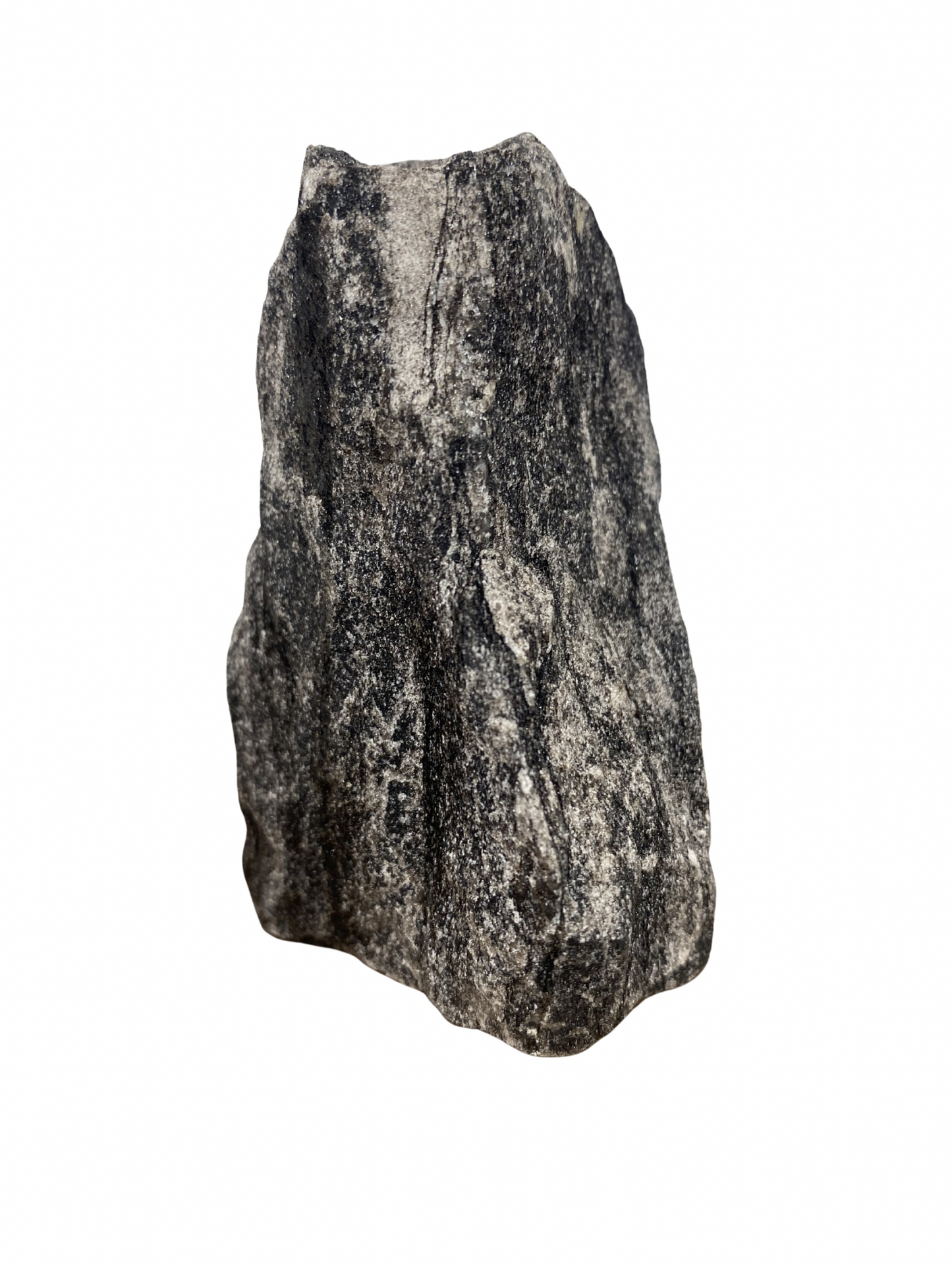 Raw Fuchsite sculpture on a stand