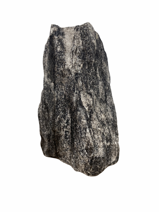 Raw Fuchsite sculpture on a stand