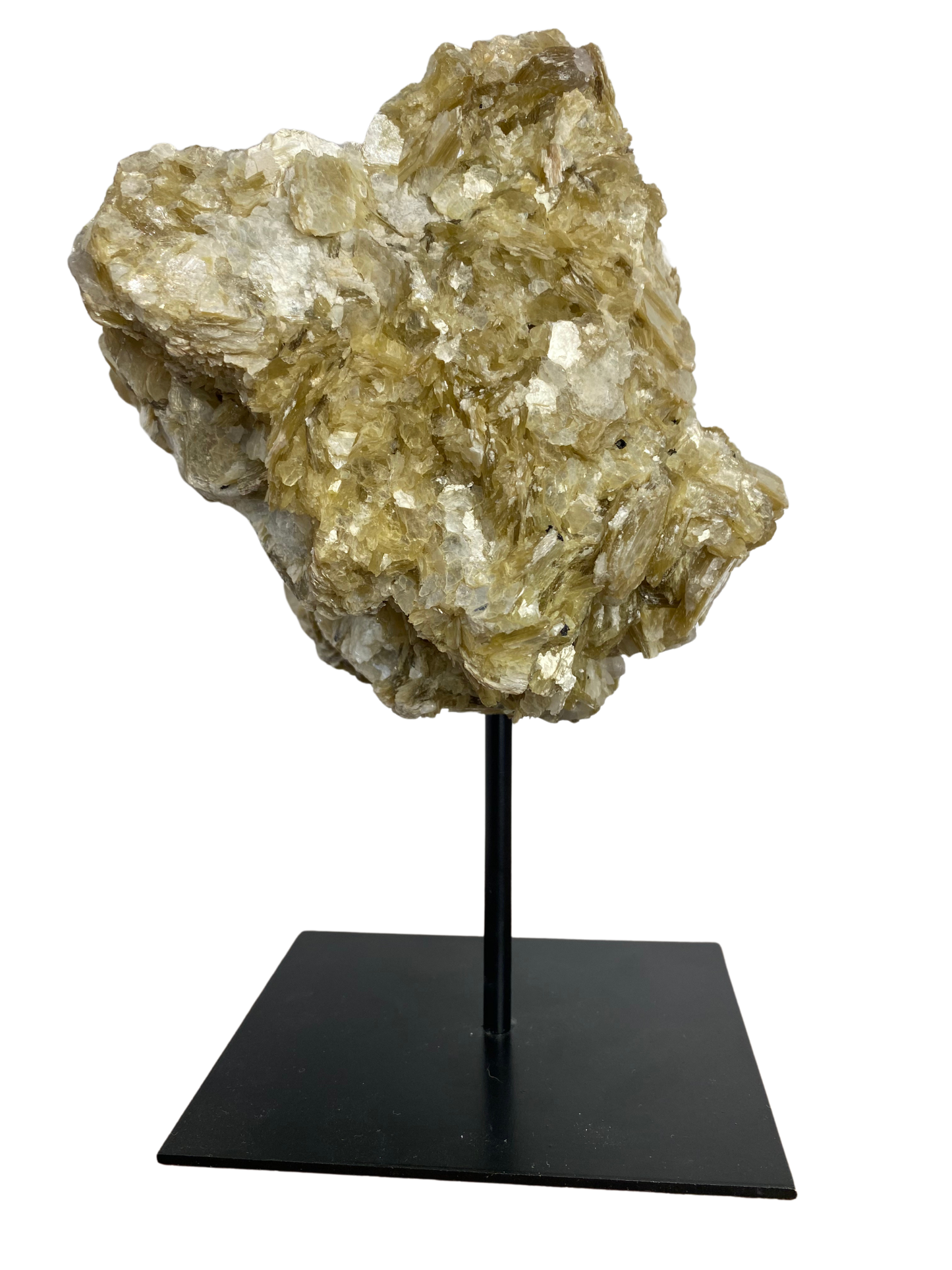 Raw Fuchsite sculpture on a stand