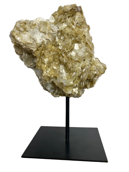 Raw Fuchsite sculpture on a stand