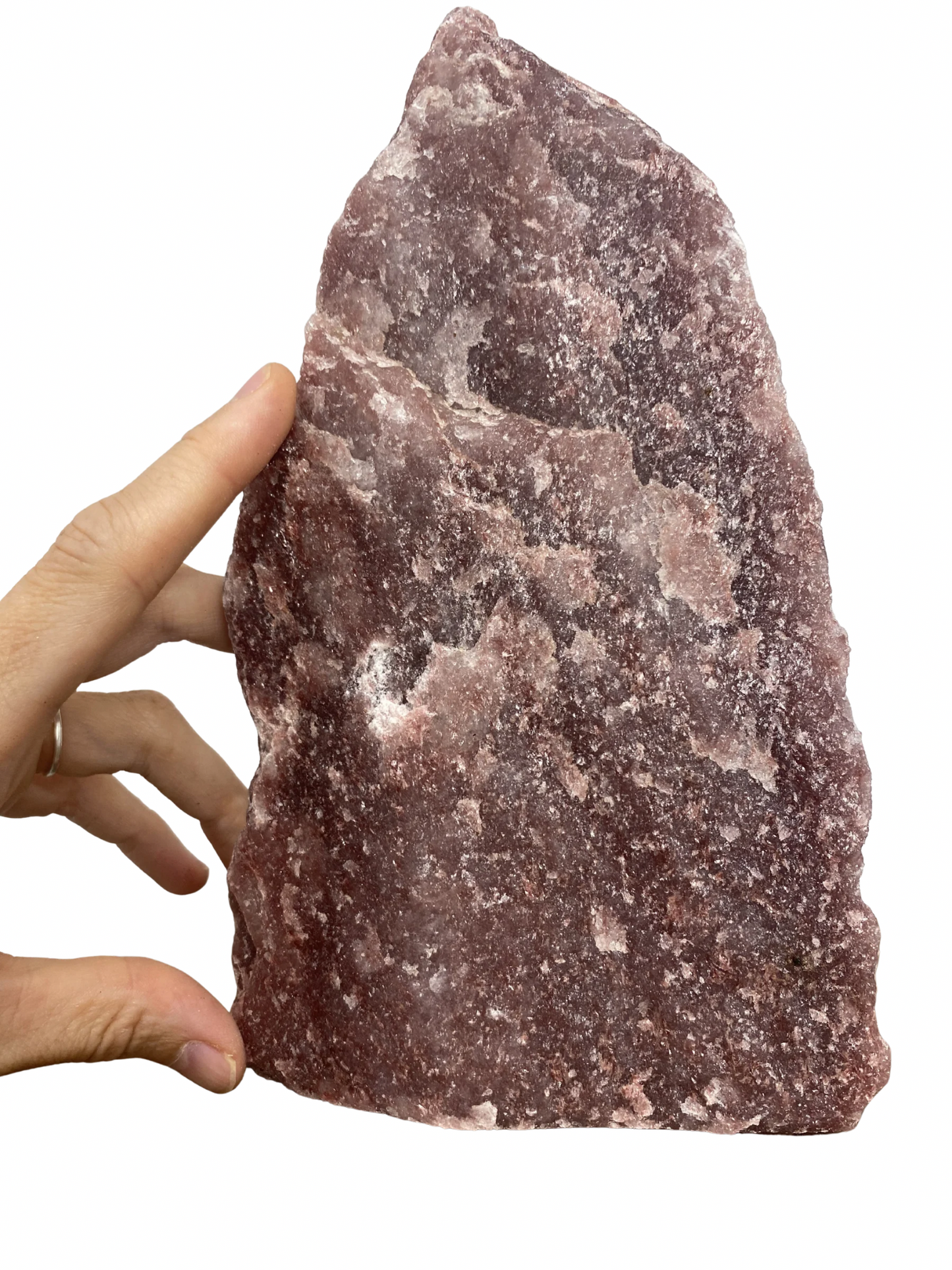 Raw Fuchsite sculpture on a stand