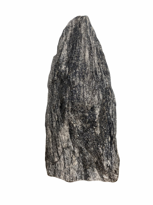 Raw Fuchsite sculpture on a stand