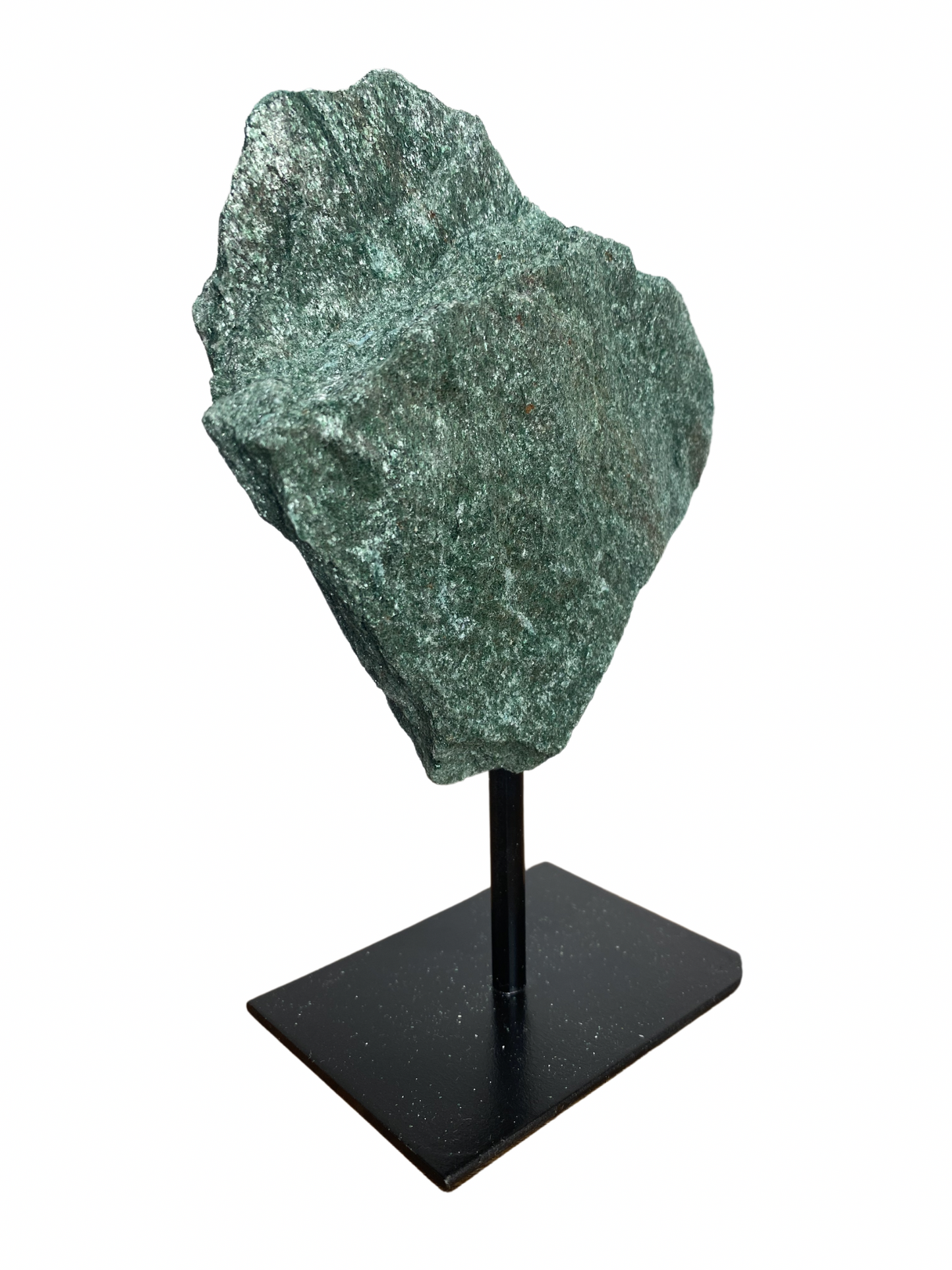 Raw Fuchsite sculpture on a stand