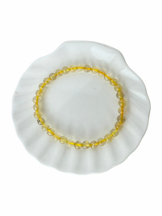 Rutilated quartz bracelet ball 6 mm