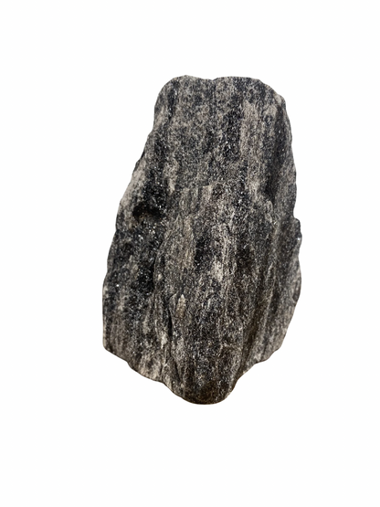Raw Fuchsite sculpture on a stand