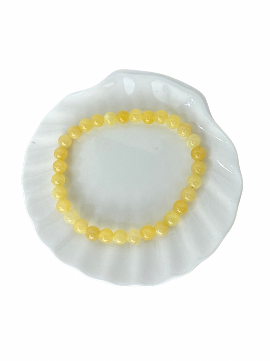 Oranje (Gele) Calciet kogelarmband 6 mm