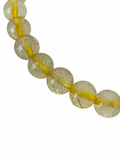 Rutilated quartz bracelet ball 6 mm