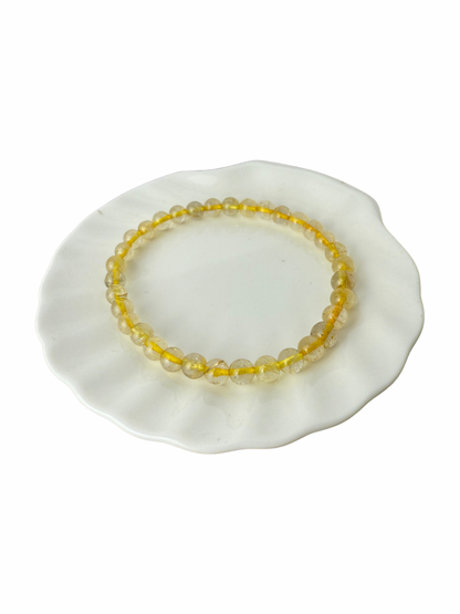 Rutilated quartz bracelet ball 6 mm