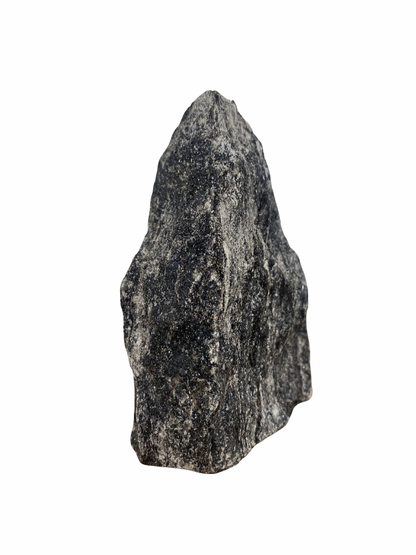 Raw Fuchsite sculpture on a stand