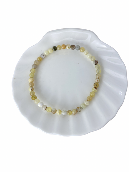 Gele Opaal kogelarmband 4 mm