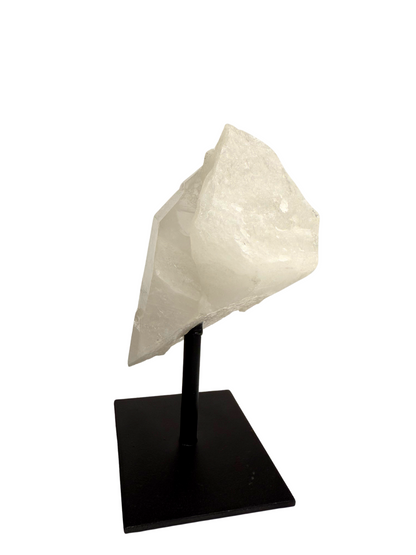 Raw rock crystal point on stand