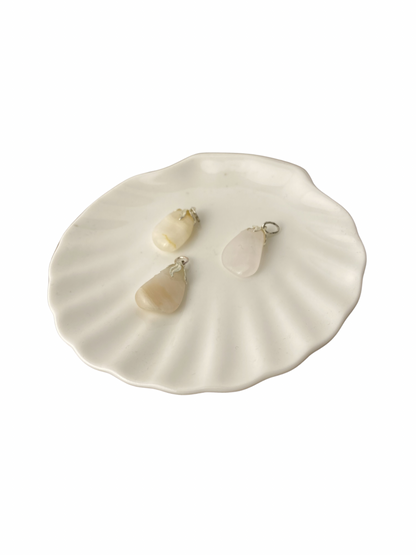 Mangano Calciet trommelsteen hanger
