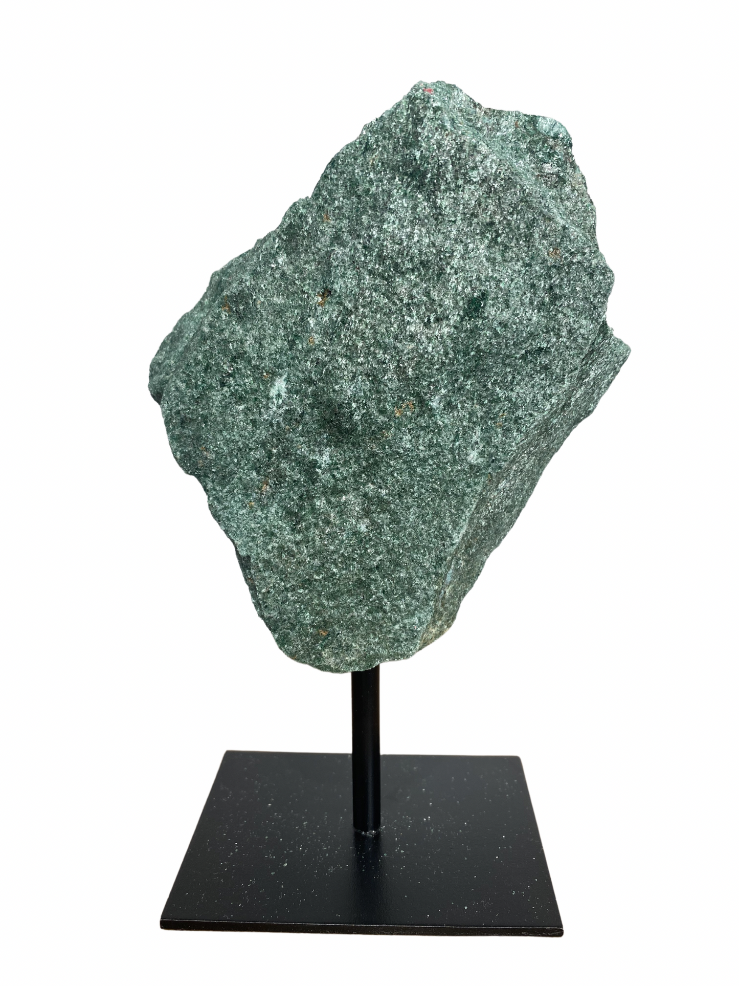 Raw Fuchsite sculpture on a stand