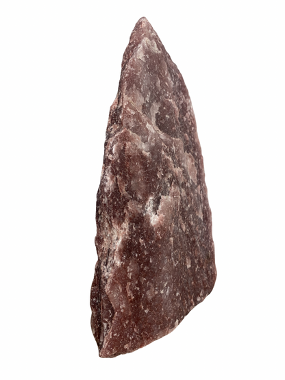 Raw Fuchsite sculpture on a stand
