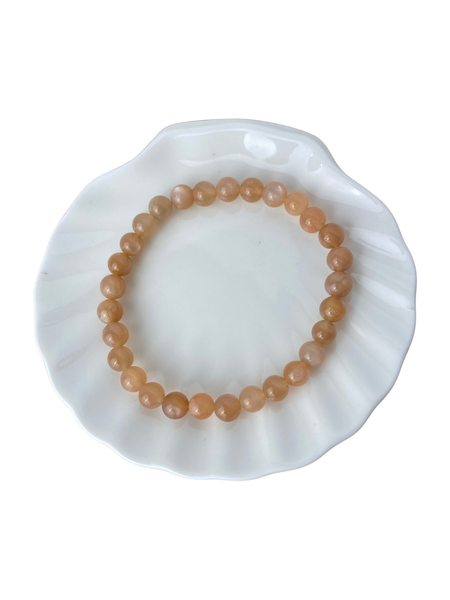 Maansteen (perzik) kogelarmband 6 mm