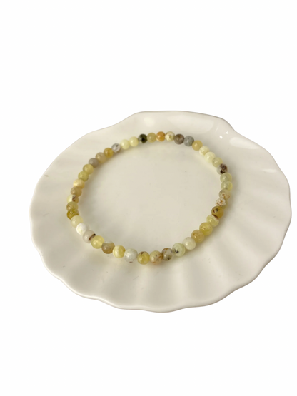 Gele Opaal kogelarmband 4 mm